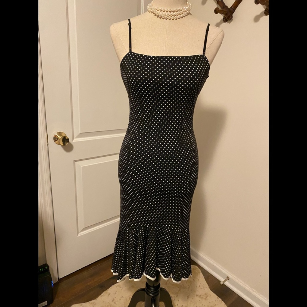 Polka dot MIDI length party dress with high low hem line. Size S